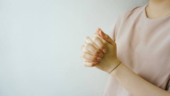 Woman hands in prayer