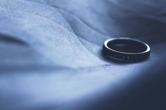 Wedding ring in palm of hand
